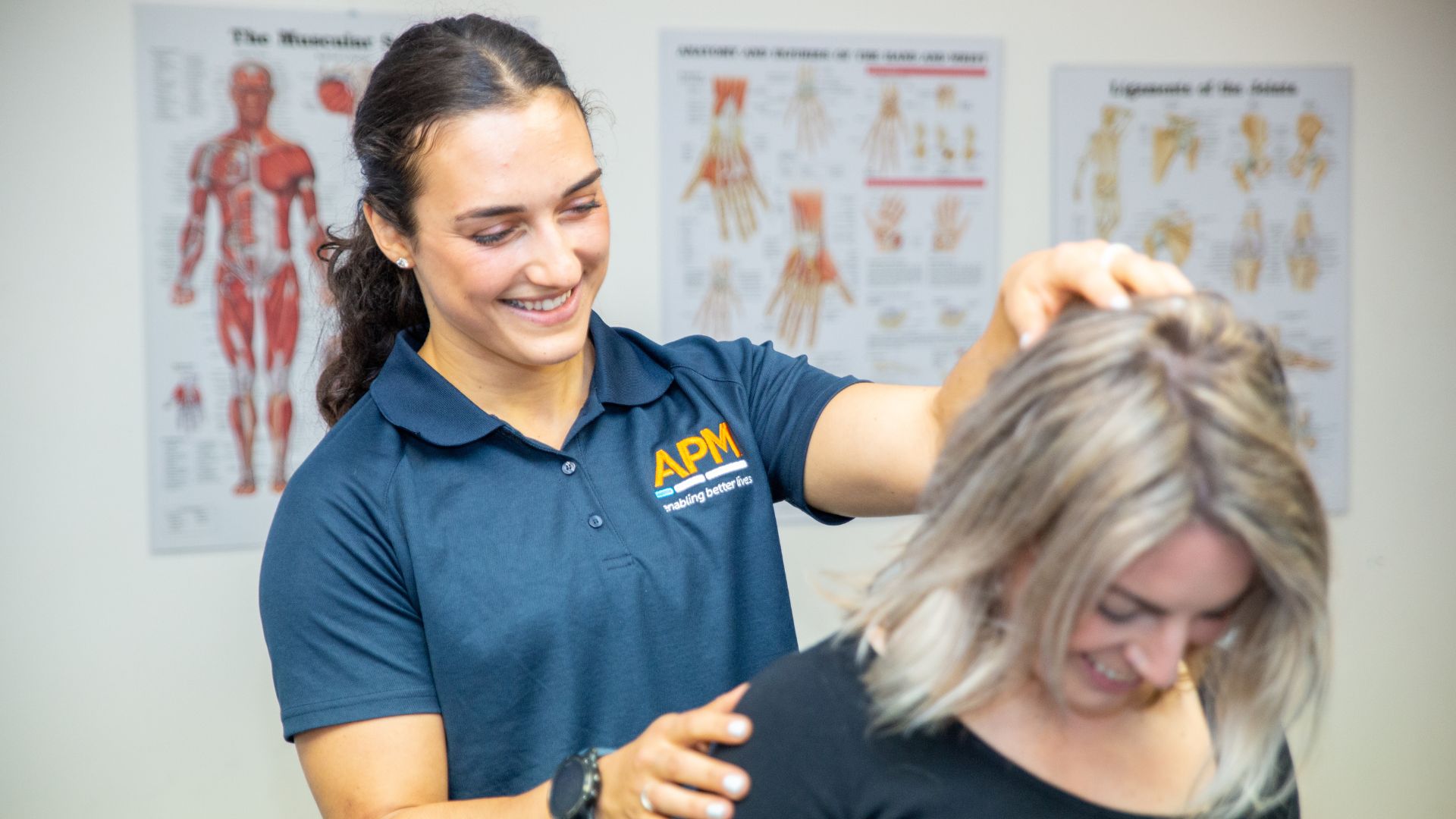 APM Physio treating a client